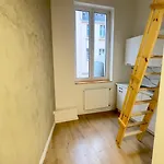 With A Mezzanine In The Center Apartman